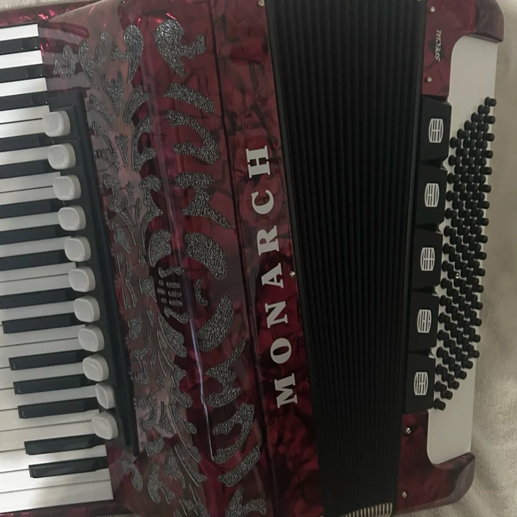 Red Monarch Special accordion with silver scrollwork